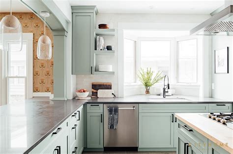 The light shade has a calming effect and we love how it works as a neutral backdrop, much like a white, beige, or grey. A pale mint green renovated kitchen