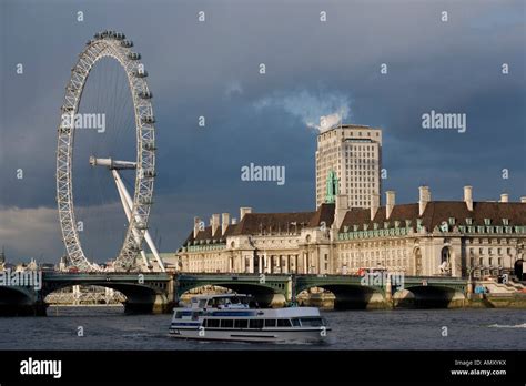 Brdige Across River With Ferris Wheel Thames River Millennium Stock