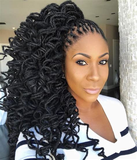 Create a victory roll style by twisting a section of your locs around a foam hair roller for the signature shape. Black Women with Dreadlocks Hairstyles, Best African American Dreadlock Styles