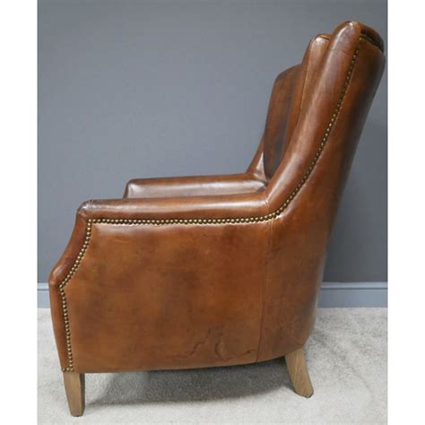 Leather armchairs are a luxurious item. Vintage Leather Club Armchair
