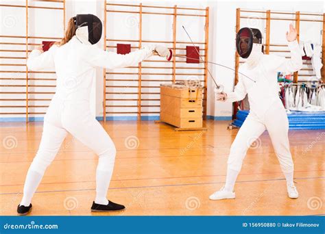 Women Fencers In Duel At Fencing Sparring Stock Photo Image Of Battle Defence