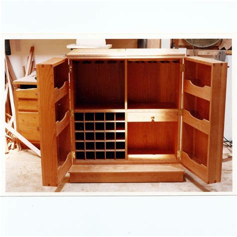 Get more information about this episode >>. Hand Made Fold Out Liquor Cabinet by Sawyer Cabinetry | CustomMade.com | Bar cabinet design ...