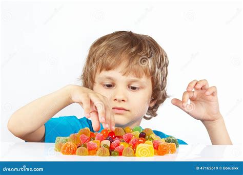 Little Blonde Child Jelly Candies White Background Stock Photos Free