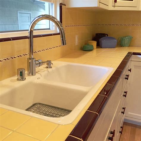 Tile kitchen countertops pictures ideas from hgtv hgtv via hgtv.com. Carolyn's gorgeous 1940s kitchen remodel featuring yellow ...
