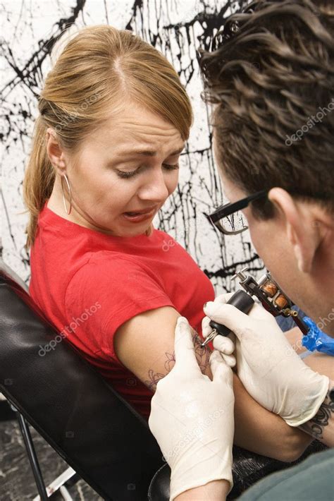 Woman Getting Tattooed — Stock Photo © Iofoto 9227736