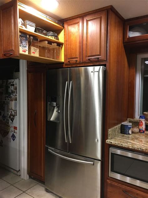 Kitchen cabinet used as a noun is very rare. When my dad built my kitchen cabinets seven years ago, he made these custom drawers on t ...
