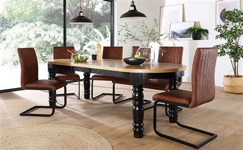 Get 5% in rewards with club o! Manor Oval Painted Black and Oak Extending Dining Table ...
