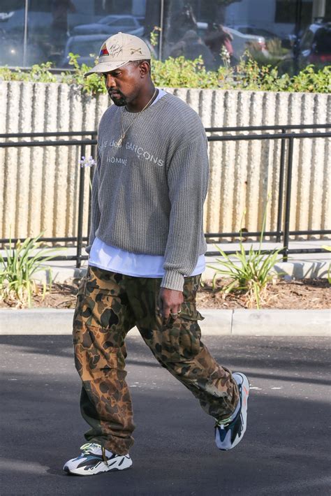 Kanye West Wearing Comme Des Garçons Sweater Adidas Yeezy Wave Runner