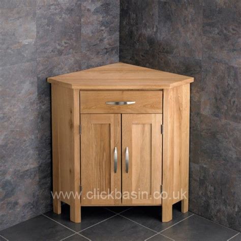 A Wooden Corner Cabinet With Two Doors