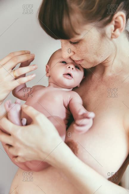 Nude Mother Holding Her Newborn Baby Stock Photo OFFSET