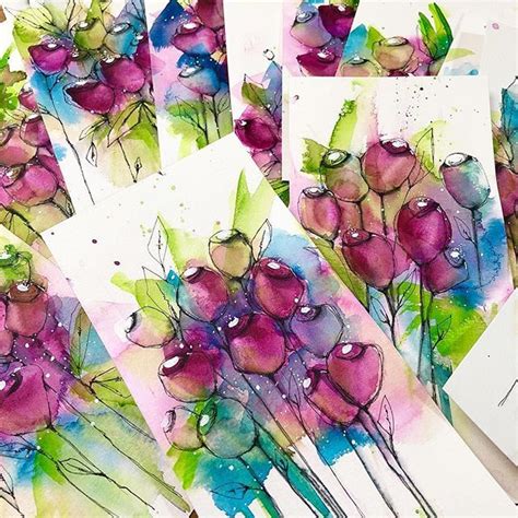 Several Watercolor Paintings With Flowers On Them