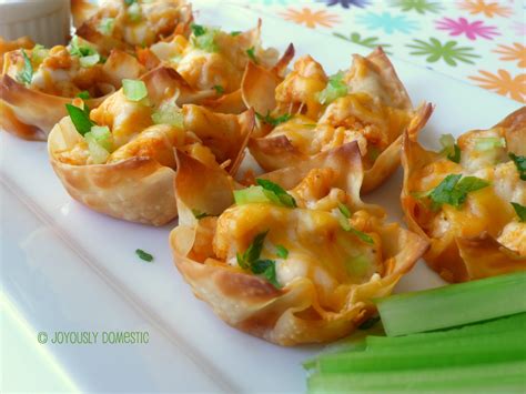 Press wonton wrappers into miniature muffin cups coated with cooking spray. Joyously Domestic: Buffalo Chicken Wonton Cups