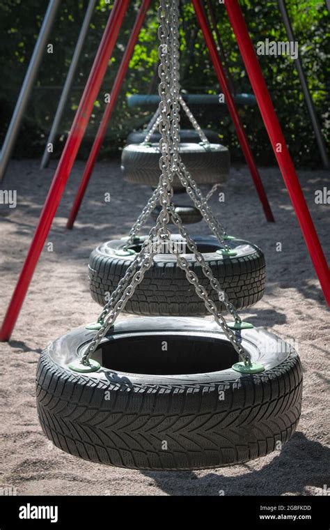 Swing Made With Car Tires In The Playground Stock Photo Alamy