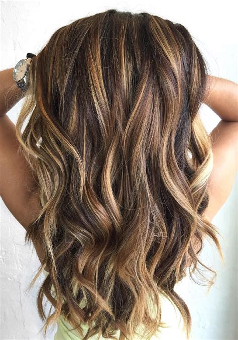 Lots Of Blonde Highlights In Dark Brown Hair