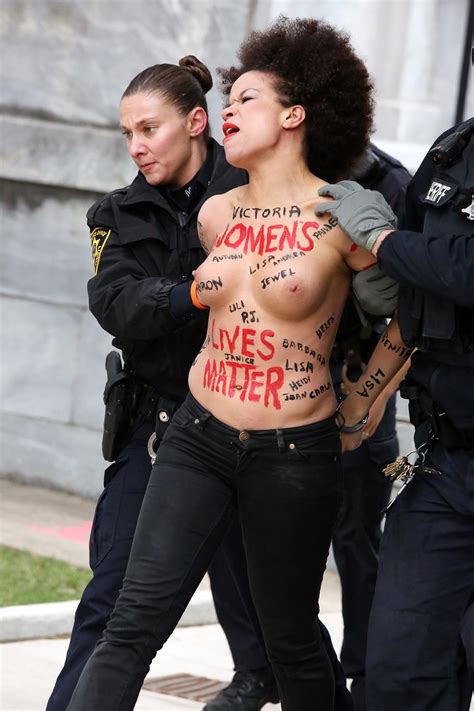 Police Taking Away A Protestor Topless Nicole Rochelle Pictures The