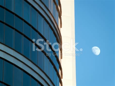 Skyscraper And Moon Stock Photos