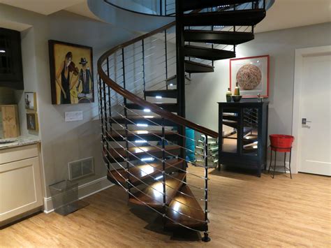 Treads help cover unattractive stairs and add comfort and style to your home. Metal Spiral Staircase Photo Gallery | The Iron Shop Spiral Stairs | Spiral stairs, Spiral ...