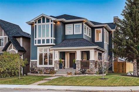 Traditional 2 Story Blue Stone Bungalow House