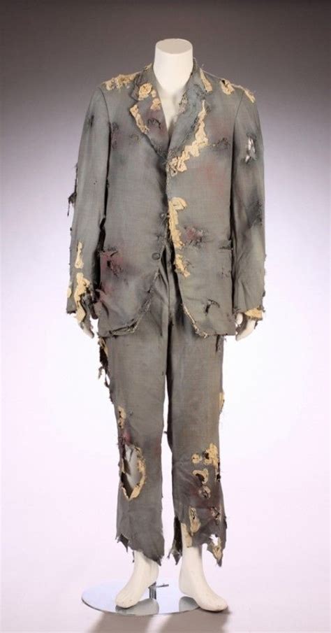 An Old Suit With Torn Paint On It