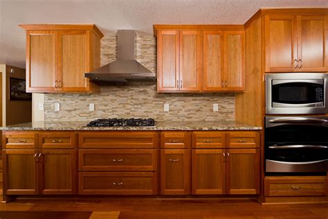 Position the door on the cabinet so that it will open in the right direction. How to Refinish Kitchen Cabinets in Your Home | Replacing kitchen cabinets, Refinishing cabinets