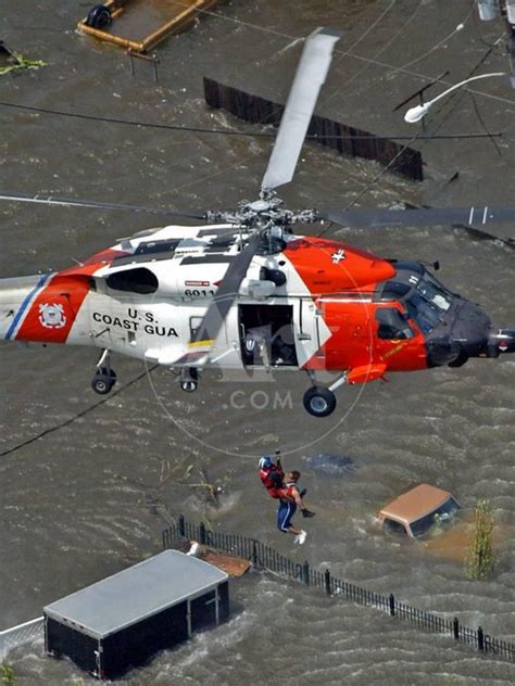 Coast Guard Rescues One From Roof Top Of Home Floodwaters From