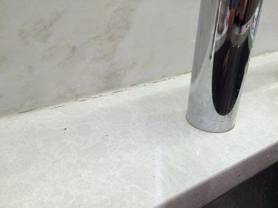 These stone kitchen sinks work well with dark or. Best way to caulk the seam between our backsplash and ...