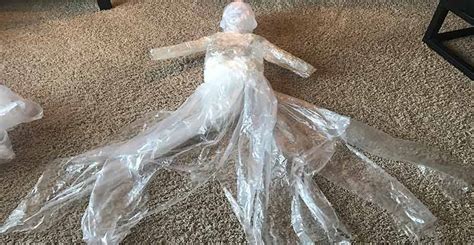 Use packing tape and trash bags over a mannequin form to get this look. Ask Wet & Forget Packing Tape Ghost Tutorial: Spooky DIY Halloween Decoration | Ask Wet & Forget