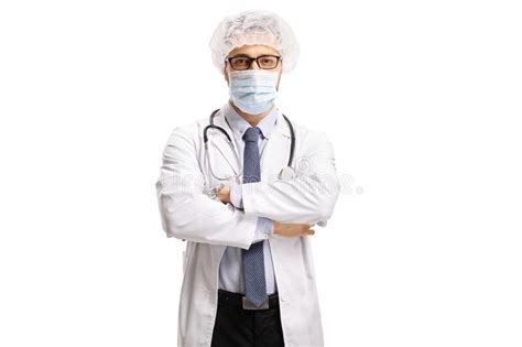 Le Médecin Avec Des Vêtements De Protection Et Le Masque Chirurgical