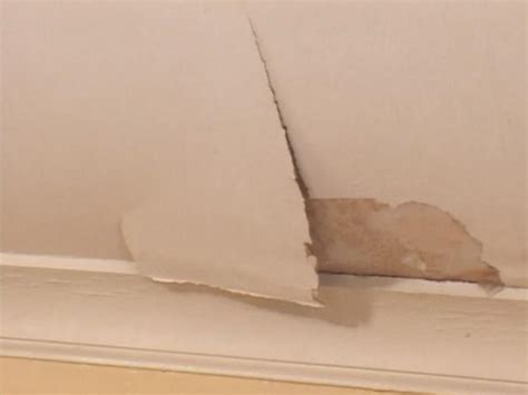 Cut a square drywall repair patch with sharp scissors so it is 1 in (2.5 cm) taller and 1 in (2.5 cm) wider than the hole you want to patch. How to Repair a Ceiling | how-tos | DIY