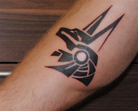 One of them is a blue crescent moon on it's side on my left hip. Stargate Tattoos - Page 34 | Tattoos, Tribal tattoos, Anubis