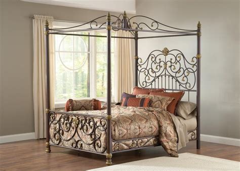 Carved Wrought Iron Four Poster Canopy Bed And On Brown Hardwood Floor