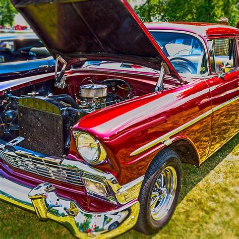 Another pretty red!!! 57 Chevy classic from the Port ...
