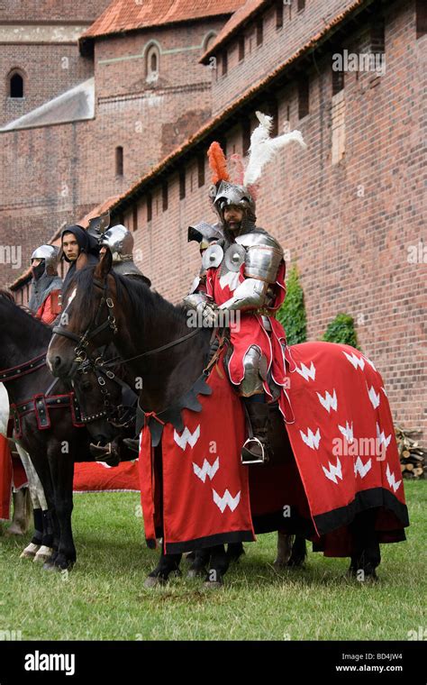 Medieval Cavalry Knights On Military Horses Presenting Themselves To