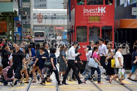 Crowd Crossing The Street In Hong Kong Central Stock Photo Download