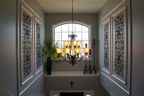 Molding And Wrought Iron In The Two Story Foyer Foyer