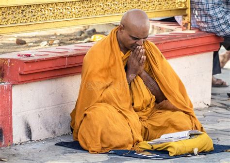 A Buddhist Monk Praying In A Temple Editorial Photo Image Of Folded