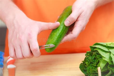 Man Preparing Vegetables Salad Peeling Cucumber Stock Image Image Of