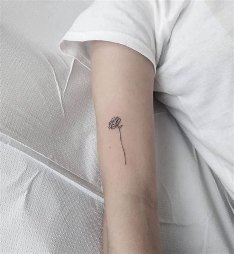 Minimalist Tattoo Ideas That Capitalize On Form Minimalist Tattoo A Minimalist Tattoo