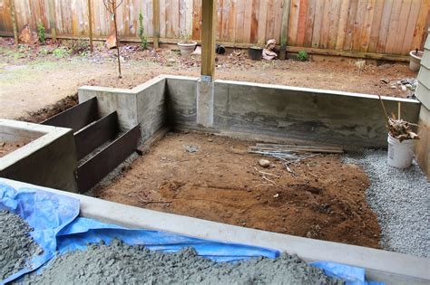 If you find you are wanting one in your garden check out these ideas for inspiration. dirt digging sisters: DIY concrete retaining wall and patio