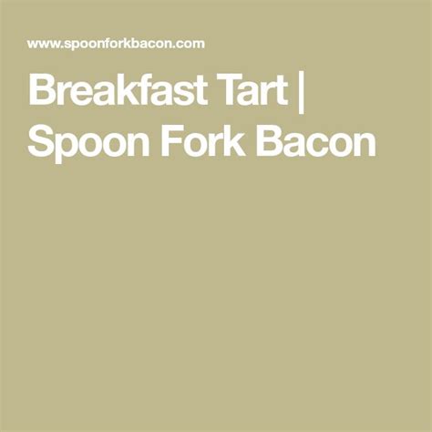 The Breakfast Tart Spoon Fork Bacon Is In Front Of A Plate With An Egg
