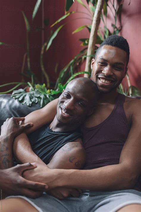 Portrait Of Gay Black Men Couple In Their Living Room By Joselito Briones