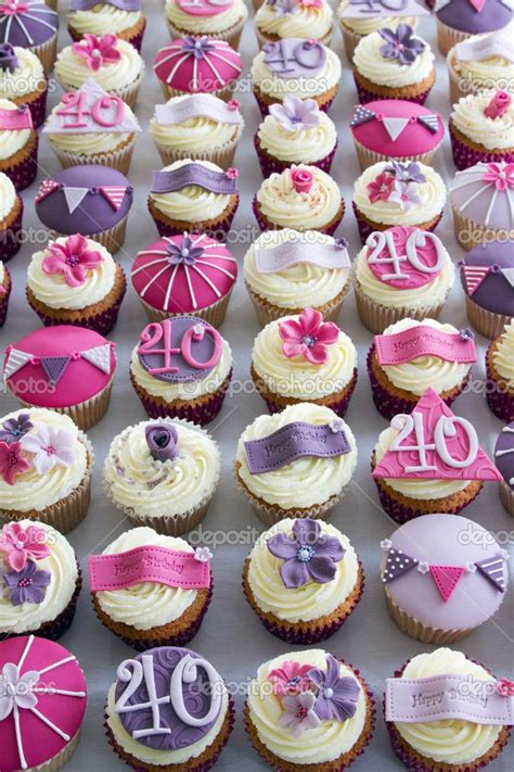 Turning 40 is a milestone in anyone's life so finding a unique 40th birthday cake design for the birthday gal or guy is just as important as the party . party cupcakes for women | 40th birthday cupcakes — Stock ...