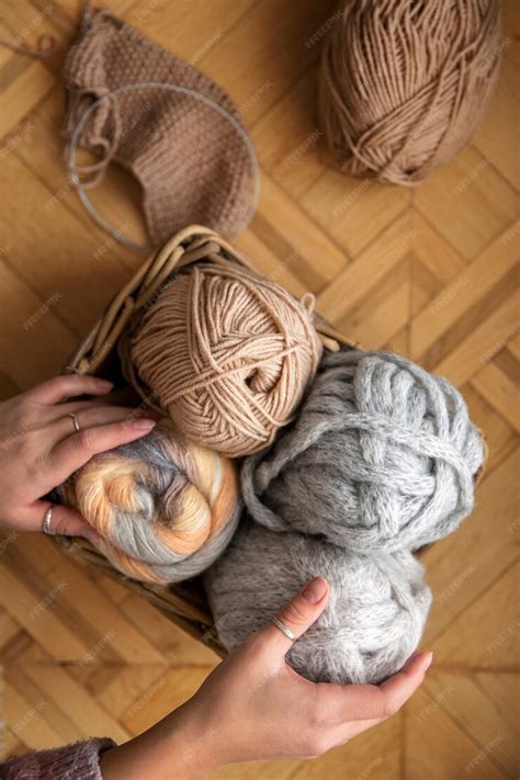 Free Photo Close Up Hands Holding Yarns