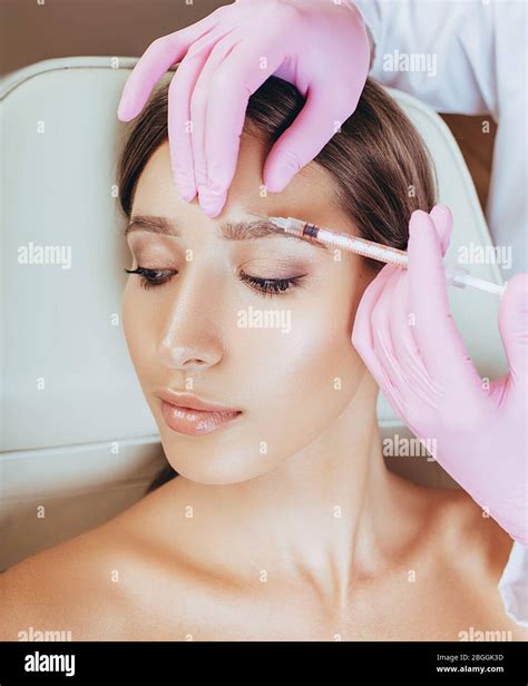 Woman With Getting Beauty Injections Botulinum Toxin Injection For