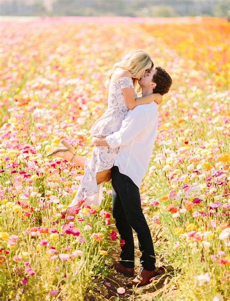 This Couple Captured Their Engagement Photos In A Flower Field Of Ranunculus Green Wedding Shoes
