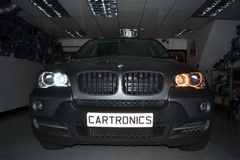 The factory bulbs are h4 halogen bulbs which gives off a dim yellowish hue light. LUX angel eyes - retrofit led headlights for BMW X5 - E70