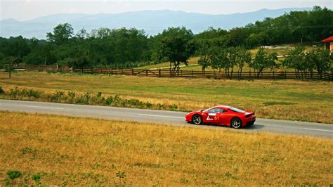 1024x768 Wallpaper Landscape Ferrari Racing Car Race Car Field