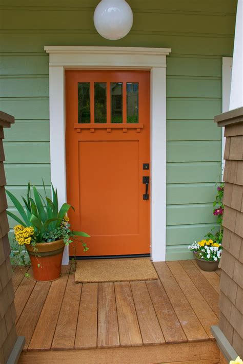 It has the potential to match and complement your garden. Pumpkin colored front doors! - Front Door Freak
