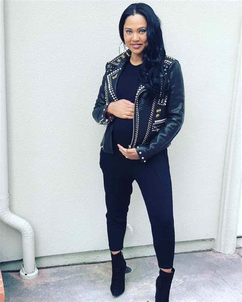 Pregnant Ayesha Curry Shows Off Baby Bump Under A Leather Jacket