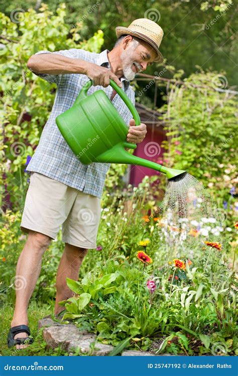 Watering The Flowers In The Garden Stock Photography Image 25747192